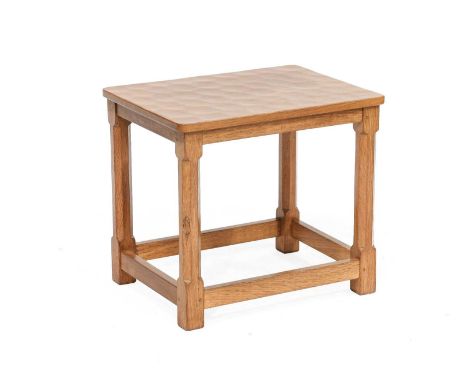 Workshop of Robert Mouseman Thompson (Kilburn): An English Oak Stool/Coffee Table, on four octagonal legs joined by rails, wi