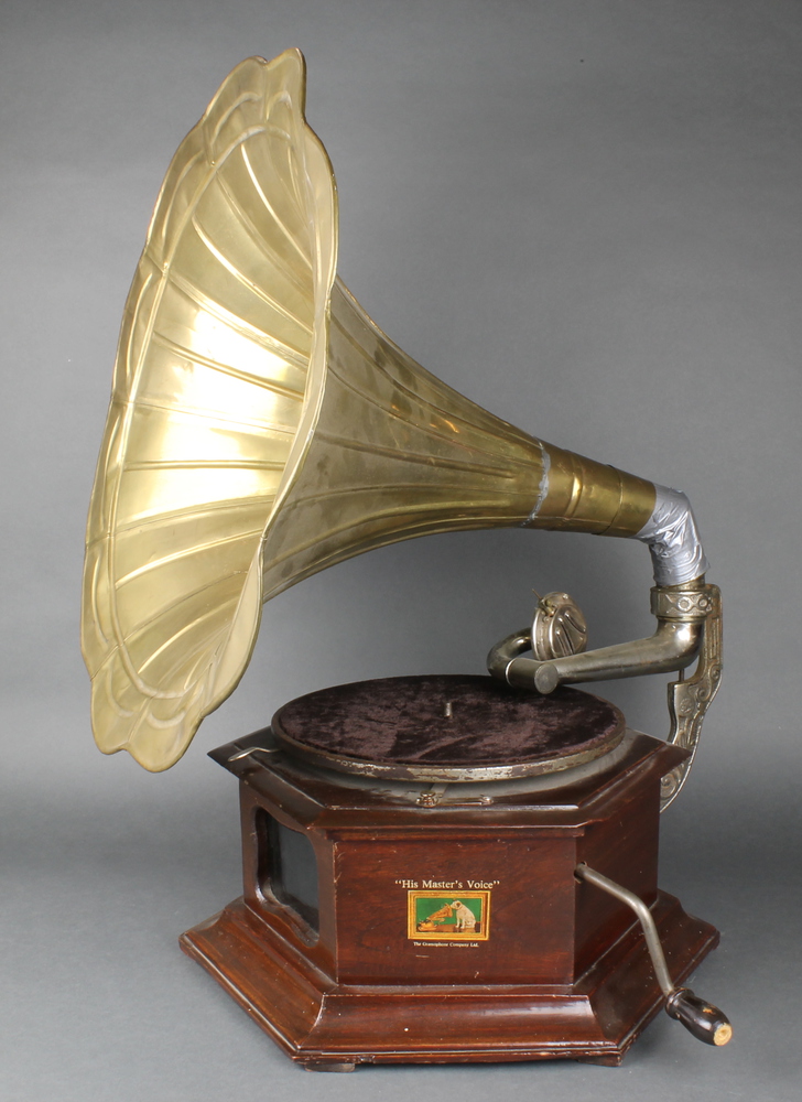 A reproduction His Master's Voice horn gramophone with brass horn and ...