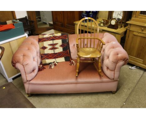 A late Victorian upholstered and button back Chesterfield two seater settee