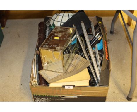 A box containing a mirrored glass trinket box; a Tiffany style light shade; a telephone; a soda syphon etc.
