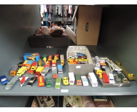 A shelf of playworn diecasts including Matchbox, Dinky, Corgi Juniors and similar