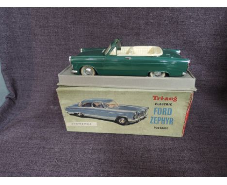 A Triang Minic Electric Battery Operated 1:20 scale plastic model, Ford Zephyr in green with cream interior, number plate XPJ