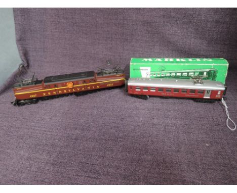 A Marklin HO scale Restaurant Car SBB CFF part boxed along with a made in Slovenia HO scale Pennsylvania 4907 Locomotive