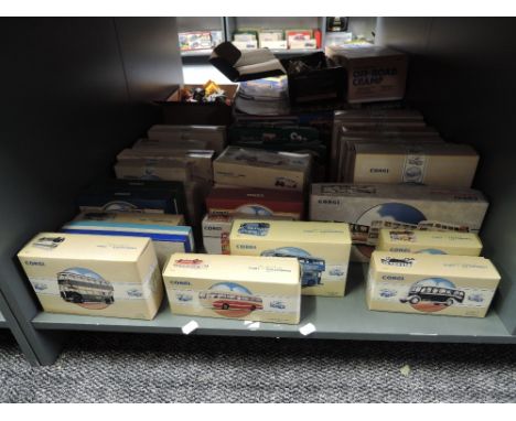 A shelf of 1990's Corgi diecast Buses including vintage Bus Sets and Individual Buses, (30), all boxed