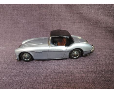 A 1960's Bandai tinplate and friction driven Austin Healey Hardtop in Light Blue with black roof