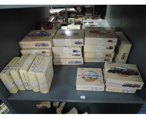 A shelf of twenty one modern Corgi Classic diecasts, all two bus sets and boxed