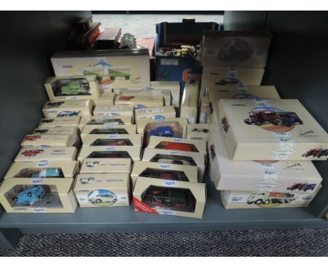 A shelf of approx forty modern Corgi Classic diecasts including two vehicle sets, Cars, Vans, Wagons etc, all boxed