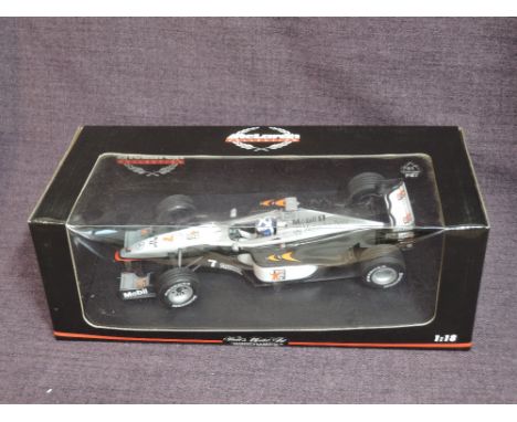 A Minichamps 1:18 scale diecast, Mclaren F1 Racing Car, boxed