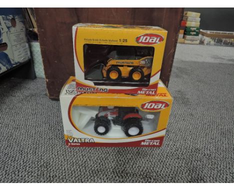 Two Joal diecasts, 1:25 scale 20005JO Mustang 2105 Skid Steer and 1:32 scale 174 Valtra S Series, both boxed