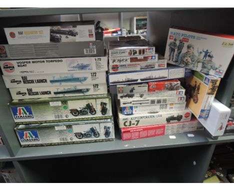 A collection of Twenty Three mixed scale plastic Military related Kits including Italeri 1:9 US WWII Motorcycle x2, Airfix 1: