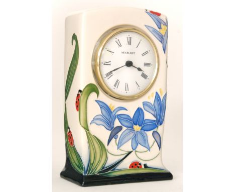 A Moorcroft Pottery mantel clock decorated in the Fly Away Home pattern designed by Rachel Bishop, impressed and painted mark
