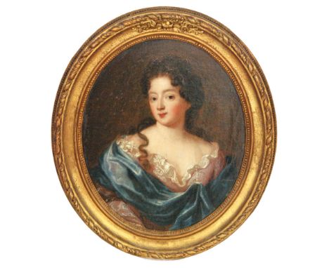 CIRCLE OF SIR GODFREY KNELLER (1646-1723) - Portrait of a young lady wearing a lace trimmed pink dress and blue sash, half le