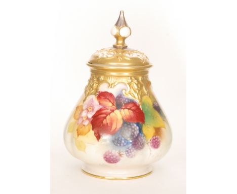 A Royal Worcester pot pourri and spire cover decorated with hand painted autumnal fruit and berries by Kitty Blake, signed, p