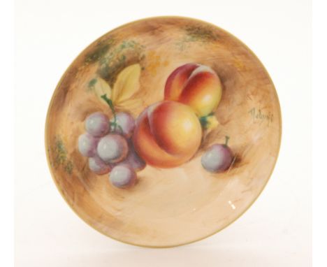 A Royal Worcester Fallen Fruits pin dish coaster decorated by Roberts with hand painted grapes and peaches, signed, black pri
