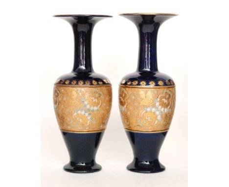 A large pair of Royal Doulton Chine Ware vases of footed shouldered ovoid form with flared collar neck, decorated with a cent