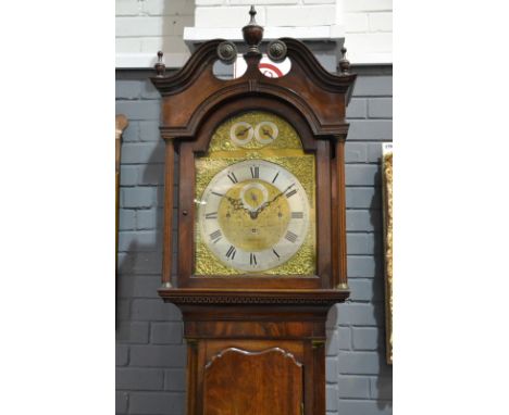 A mahogany cased longcase clock with later associated eight day movement and dial, the case and hood with twin swan neck pedi