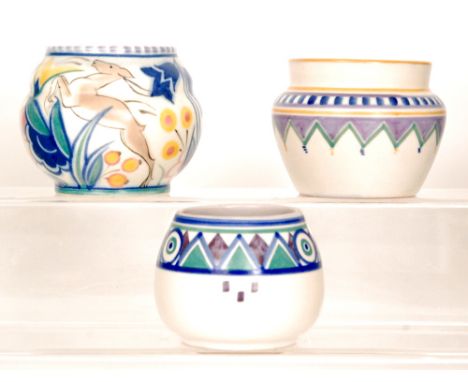 Three small Poole Pottery vases comprising one shape 94 vase in the WL pattern, one in the KZ pattern and one in the TZ patte