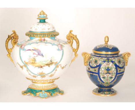 A late 19th Century Royal Crown Derby twin handled vase and cover decorated with a hand painted stylised hoho bird perched on