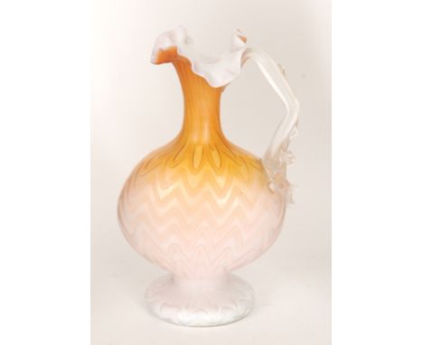 A late 19th Century Continental quilted satin air trap ewer of footed and compressed ovoid form with collar neck and tri form