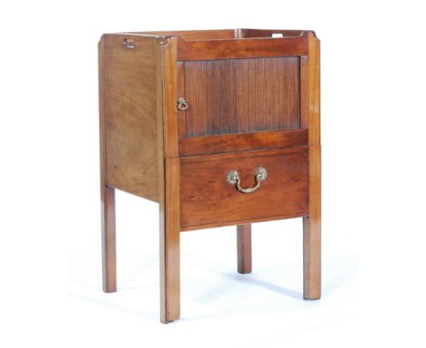 A George III mahogany tray top bedside commode, the base with pull out drawer revealing a white ceramic liner, width 50cm