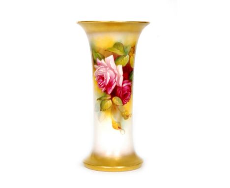 A Royal Worcester shape G923 trumpet vase decorated by Millie Hunt with hand painted roses, signed, puce mark with date code 