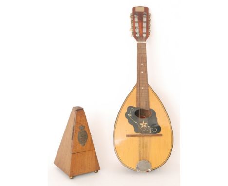A Maezel metronome and an eight string lute (2)