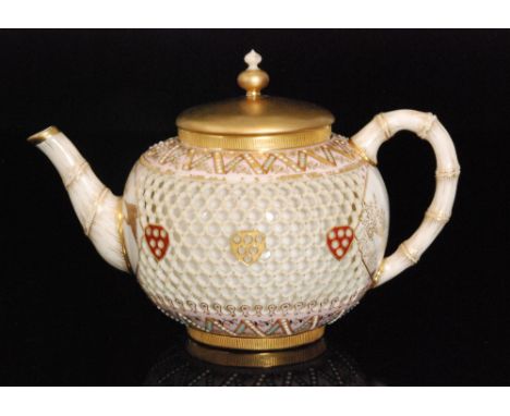 A late 19th Century Royal Worcester Aesthetic reticulated teapot and cover in the manner of George Owen, the globular double 