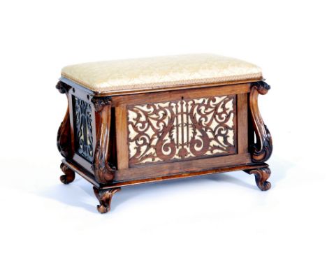 A 19th Century rosewood Canterbury music stool with fitted divisional interior below a pale leaf tapestry seat, fret panel si