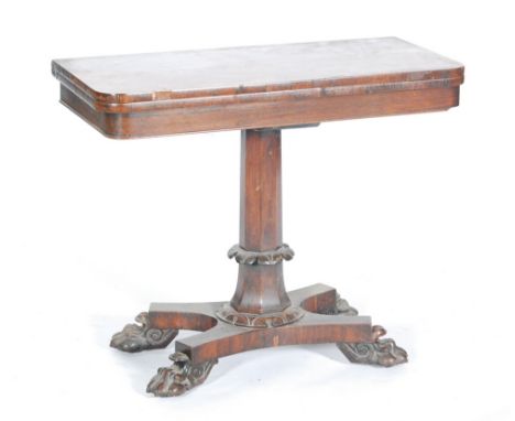 A William IV rosewood fold-over card table, raised to a faceted support and a quatrefoil base with lions paw feet, height 76c