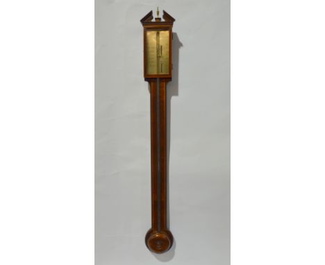 A George III line inlaid mahogany stick barometer, the scale inscribed 'Ade Ambrose Birmingham' enclosed by a glazed door bel