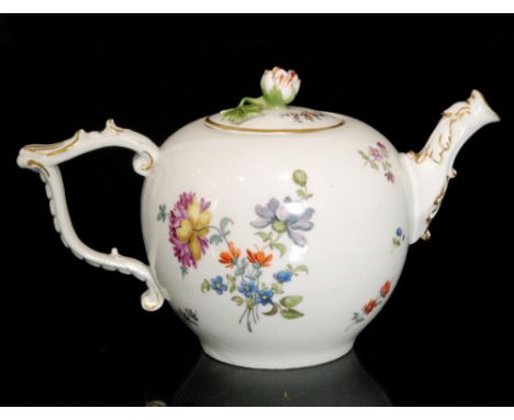 A late 18th Century Meissen porcelain teapot and cover of bullet form with tau handle and dragon spout decorated with hand pa