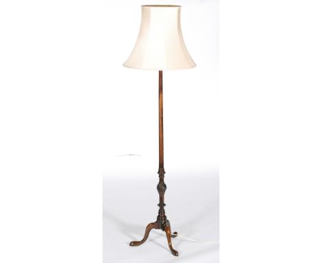 A 20th Century mahogany standard lamp and shade, height 150cm