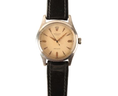 ROLEX OYSTER PRECISION: A GENTLEMAN'S STAINLESS STEEL WRISTWATCH with manual wind movement, the cream-coloured honeycomb dial