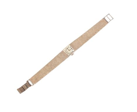 OMEGA: A LADYS 9CT GOLD BRACELET WATCH with manual wind movement, the gold dial with gold baton numerals and gold hands, no. 