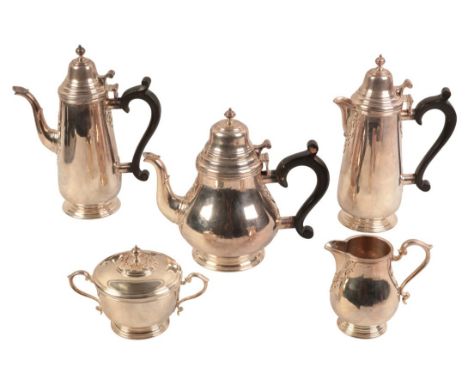 AN ELIZABETH II SILVER FIVE PIECE TEA AND COFFEE SERVICE by A. Haviland Nye, London 1974 of 18th Century design with 'cut car