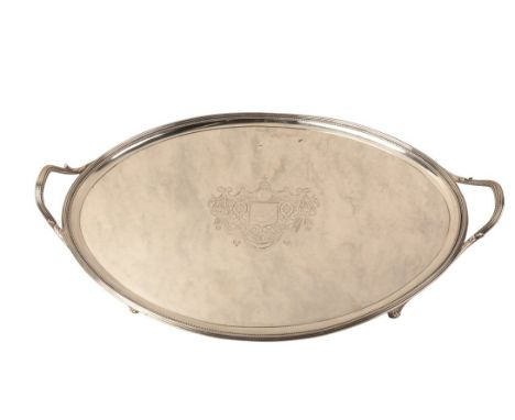 A GEORGE III SILVER OVAL TWO HANDLED TRAY by John Crouch I and Thomas Hannam, London 1791, with reeded and beaded rim, on fou