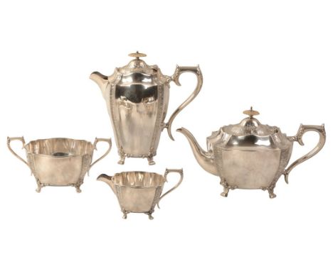 AN EDWARD VII SILVER FOUR PIECE TEA SERVICE by John Henry Potter, Sheffield 1902/3, of heavy gauge, the serpentine bodies wit