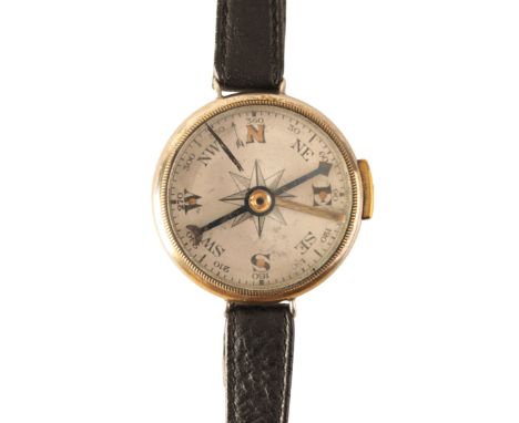 A GENTLEMAN'S NICKEL-PLATED &amp; BRASS PILOT'S COMPASS on a black leather strap, circa 1920's, the case c.36mm diameter