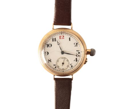AN OFFICERS 18CT GOLD TRENCH WATCH with manual wind movement, the white enamel dial with subsidiary seconds dial, black Arabi