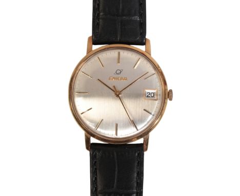 ENICAR: A GENTLEMAN'S 18CT GOLD WRISTWATCH with manual wind movement, the silver dial with gold baton numerals and hands, dat