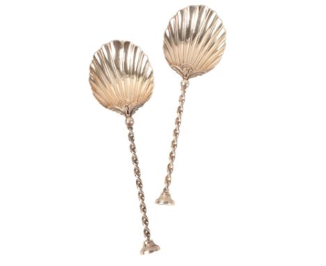 A PAIR OF EDWARD VII SILVER SERVING SPOONS by Mappin &amp; Webb, London 1904, with scalloped bowls, spiralled terminals and s