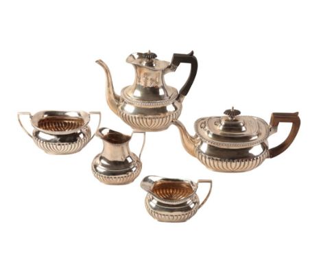 A VICTORIAN SILVER FIVE PIECE TEA AND COFFEE SERVICE by Goldsmith's Alliance, London 1892, with part gadrooned bodies, compri