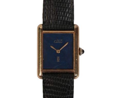 CARTIER: A GENTLEMAN'S GOLD-PLATED WRISTWATCH (Must de Cartier), with manual wind movement, the blue dial with gold hands and
