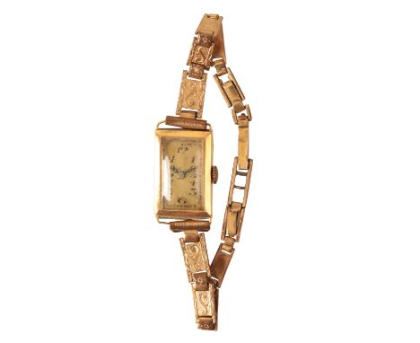 A LADY'S 18CT GOLD WRISTWATCH with manual wind movement, the gold dial with black Arabic numerals and dark blue steel hands, 