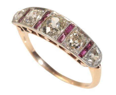 A DIAMOND AND RUBY RING gold coloured metal setting, with five antique cut diamonds, the largest 5.38mm x 4.22mm x 2.80mm, cl