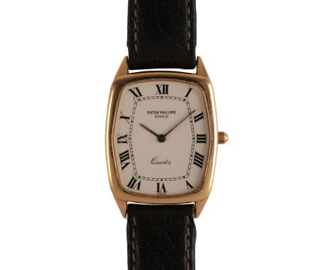PATEK PHILIPPE ELLIPSE: A GENTLEMAN'S 18CT GOLD WRISTWATCH with quartz movement, the rectangular white dial with black Roman 