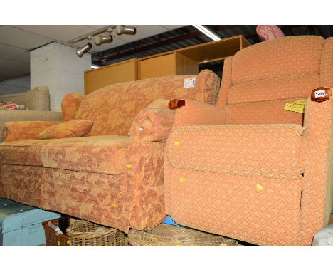 AN UPHOLSTERED TWO SEATER SOFA BED, with a similar manual reclining chair (2)