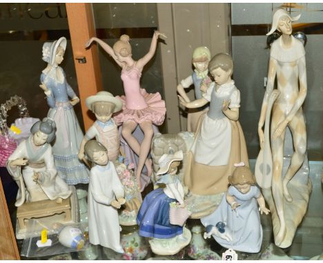 A GROUP OF FIGURES, to include Lladro and Nao, (mostly with damage), Nao girl with dog, large Nao 'Sad Harlequin', Lladro No4