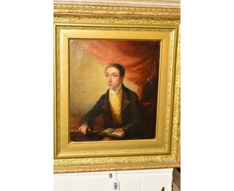 T (?) BALLARD (BRITISH, EARLY 19TH CENTURY), Half length portrait of a young man seated at a table with an open book resting 