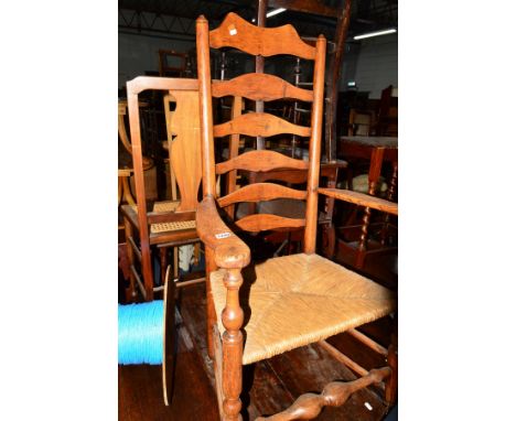 A 19TH CENTURY OAK AND ELM RUSH SEATED LADDER BACK ELBOW CHAIR, together with three various Edwardian chairs and two other ch